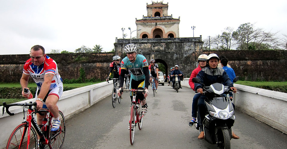 Cycling past temples and cultural landmarks in Asia